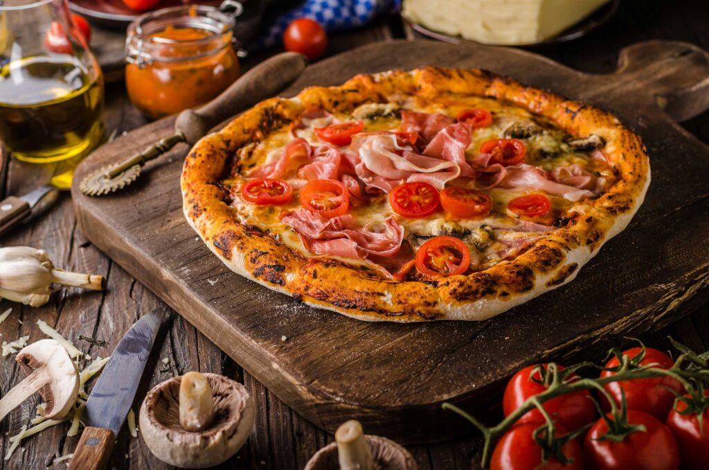 L’Histoire Secrète de la Pizza Lyonnaise : Entre Tradition et Innovation